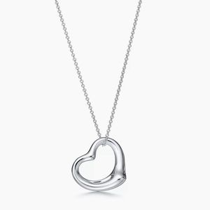 Tiffany & Co. Open Heart Pendant Necklace. Needs to be polished! Comes with box